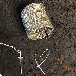 Silver toned beaded cuff bracelet.